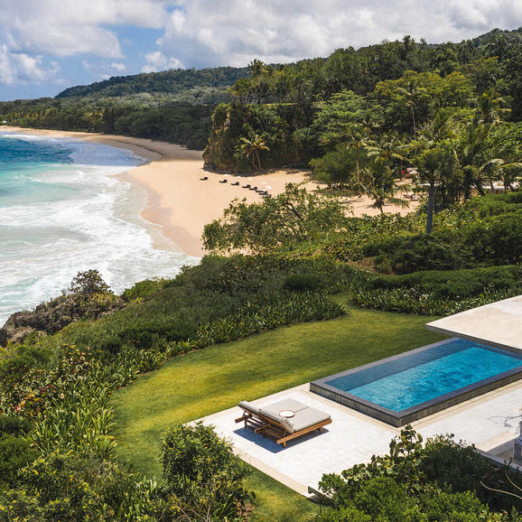 Casita with infinity pool overlooking tropical beach and forest at Amanera.