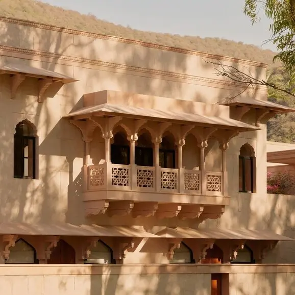 Terrace Haveli Suite exterior at Amanbagh, showcasing traditional sandstone architecture with carved wooden balcony.