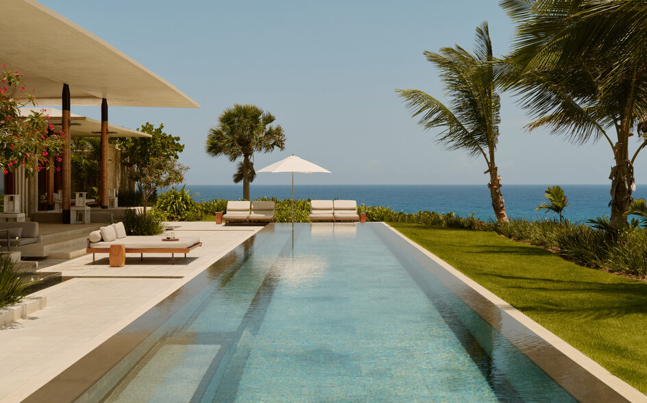 Two-bedroom casa at Amanera with infinity pool overlooking turquoise Caribbean waters.