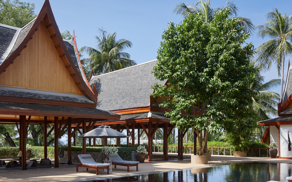 Three-bedroom garden villa with pool at Amanpuri, Thailand, featuring traditional architecture and tropical landscaping.