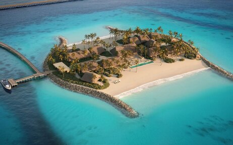 Double Beach Island Residence at Amanolu surrounded by turquoise waters and white sand beaches.