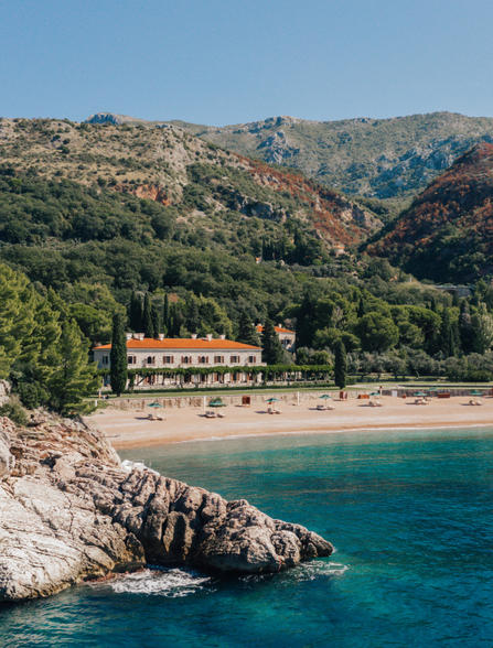 Villa Milocer at Aman Sveti Stefan overlooks turquoise waters and rocky Adriatic coastline, Montenegro.