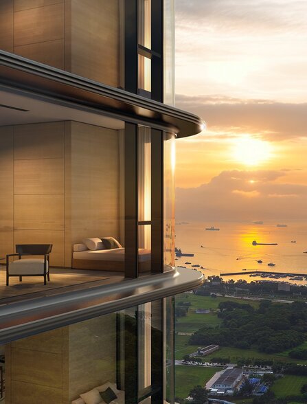 Aman Residences Singapore exterior viewed through floor-to-ceiling windows at sunset, overlooking the cityscape below.