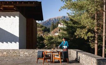 amankora-bhutan-paro-lodge-exterior-courtyard-terrace-dining.jpg