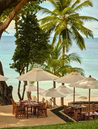 amanpuri_thailand_-_dining_beach_terrace_table_setup_upper_deck_view_andaman_sea.jpg