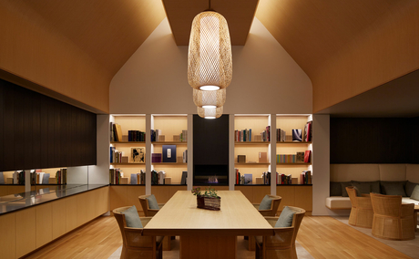 Amanemu resort spa reception with warm lighting and display shelves.