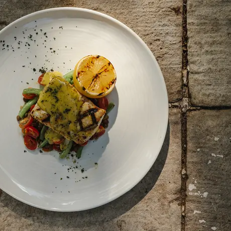 Grilled plantain topped with avocado and tomato salsa at Amanwana.