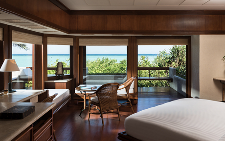 Principal bedroom with terrace overlooking gardens at Amanpulo.