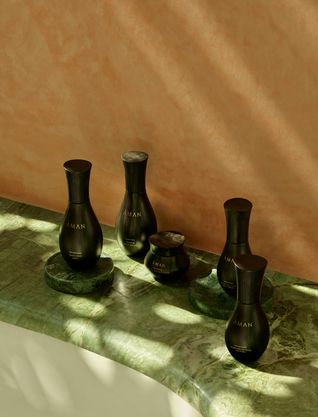 Aman Skincare Purifying Candles displayed in a row at Amanjena, Marrakech.