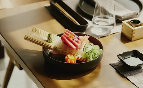 Sushi platter artfully arranged in a black bowl at Amanruya, Turkey.