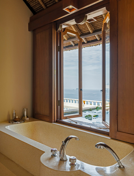 Bathtub with ocean view at Amankila, Indonesia suite.