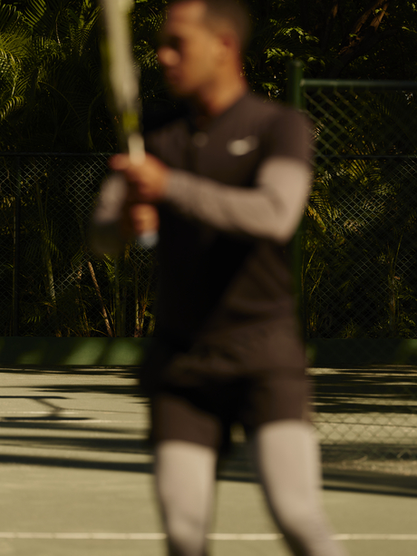 Visitor playing tennis at Amanera resort, Dominican Republic.