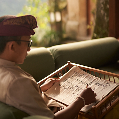 Guest studying Balinese script during Aksara Bali class at Amandari, Indonesia.