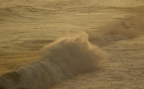 Wave rolling onto sandy beach at Amanera, Dominican Republic.