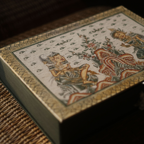 Kamasan painting with traditional Balinese figures and motifs on display at Amandari.