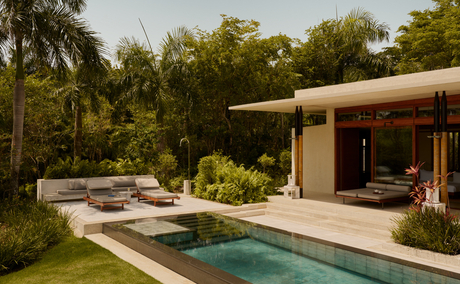 Casita exterior con piscina y jardines en Amanera resort.