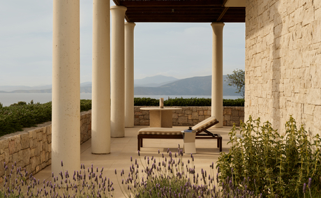 Villa terrace at Amanzoe resort overlooking the Aegean Sea and distant coastline.