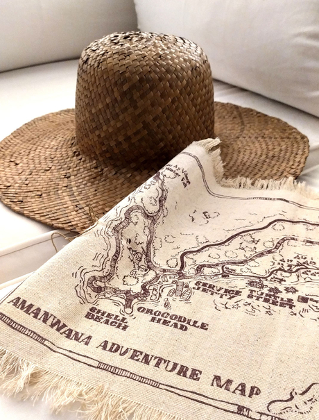 Adventure map and woven hat at Amanwana, Sumbawa, Indonesia.