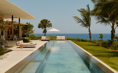 Two-bedroom casa at Amanera with infinity pool overlooking turquoise Caribbean waters.