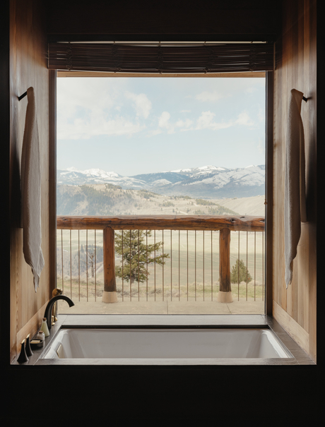Grand Teton Suite bathroom window opening onto mountain views at Amangani.