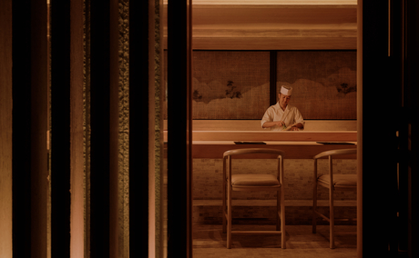 Wooden sauna interior at Aman Nai Lert Bangkok, with benches and warm lighting visible through vertical slat doors.