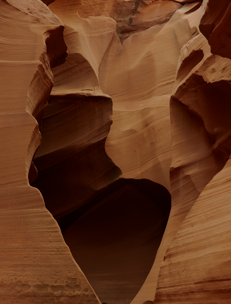 Slot canyon rock formations at Amangiri, USA, with warm terracotta-coloured sandstone walls.