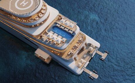 Aerial view of Amangati superyacht moored at Selora Marina with curved decks and pools visible from above.