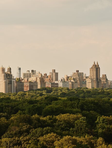 Aman New York residences with views overlooking Central Park and Manhattan's skyline.