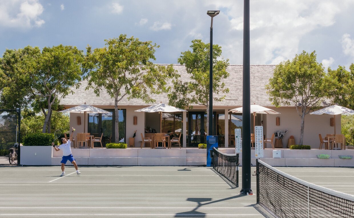 Amanyara tennis clubhouse with courts and shaded pavilions in Turks & Caicos.