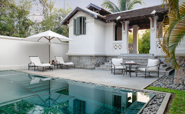 Pool Suite at Amantaka, Laos, with emerald-green plunge pool and colonial-style villa.