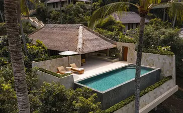 Infinity pool suite with thatched pavilion at Amankila resort, Bali.