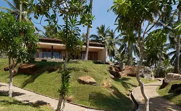 Ocean Pool Suite at Amanwella overlooking manicured gardens and tropical vegetation in Sri Lanka.