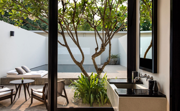 Pool suite with view of courtyard garden at Amansara, Cambodia.