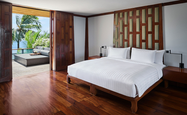 Principal bedroom with garden views at Amanpuri resort, Thailand.