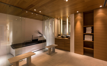 Principal bedroom with ensuite bathroom at Amanzoe resort, Greece.