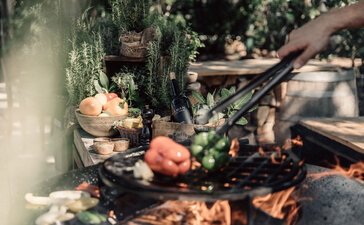 Dining table set amongst Mediterranean gardens at Aman Sveti Stefan.