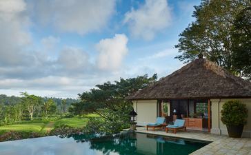 Three-bedroom villa with thatched roof overlooking infinity pool at Amandari.