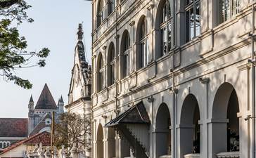 Amangalla's colonial architecture with arched verandahs and period details facing a quiet street.