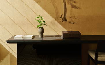 安缦纽约酒店客房细节，黑色桌面上摆放小盆植物和装饰品。