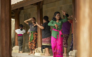 Balinese dance class participants in traditional dress at Amandari, Indonesia.