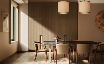 Angolo della suite con tavolo da pranzo e sedie in legno presso Aman New York.