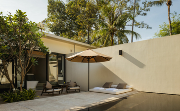Amansara's spa pavilion with canvas canopy and peaceful courtyard garden in Cambodia.