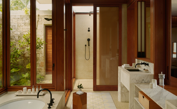 Bay View Pool Casita bathroom at Amanera with outdoor garden access and vanity.