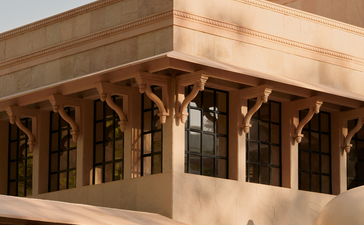 Amanbagh main building exterior detail showing carved wooden columns beneath a sandstone overhang.