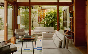 Deux-chambre Casa with bay views at Amanera resort, Dominican Republic. Wooden pavilion with open doors overlooking tropical gardens and seating area.