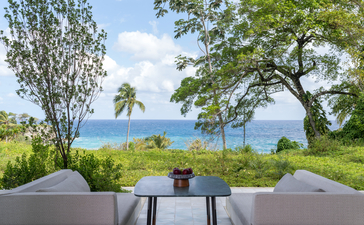 Casita avec vue sur la mer à Amanera resort, terrasse ombragée donnant sur l'océan.