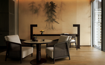 Suite principale avec bureau et fauteuil, Aman New York.