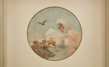 Circular ceiling fresco depicting cherubs and birds among clouds in Coccinas apartment at Aman Venice.