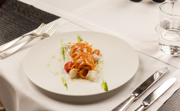 Handmade pasta dish with tomato sauce and basil at Aman Venice dining venue.