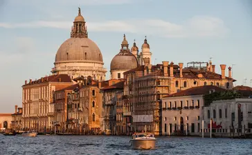 Basilica di Santa Maria della Salute and waterfront palaces along the Grand Canal, Aman Venice.